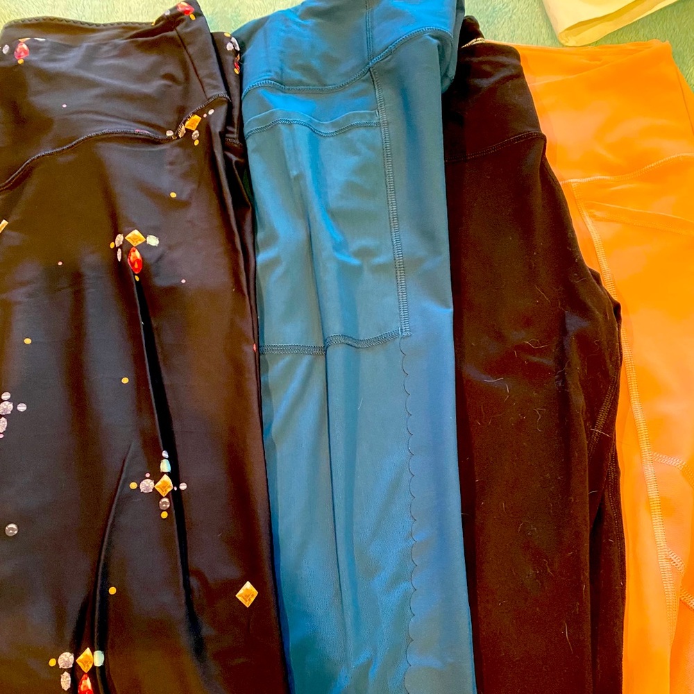 4 pairs of Victoria Sport leggings.